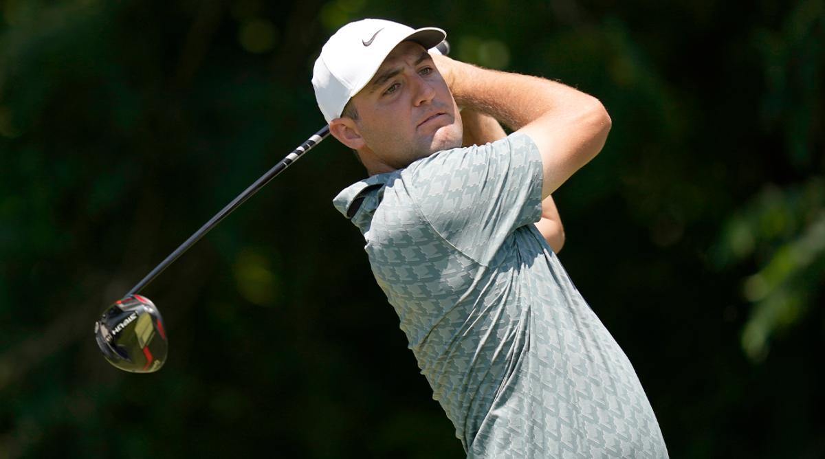 Scottie Scheffler watches his shot on the sixth tee box during the final round of the Charles Schwab Challenge golf tournament at the Colonial Country Club in Fort Worth, Texas, Sunday, May 29, 2022.