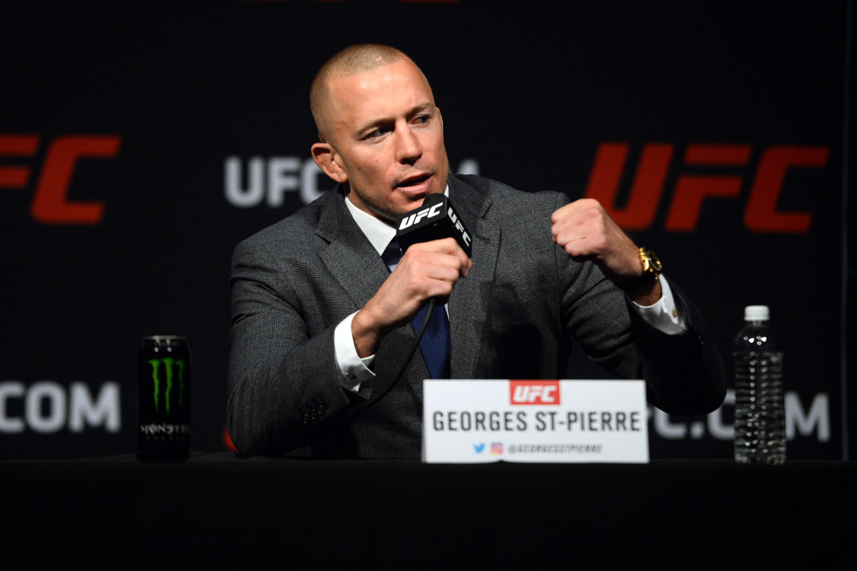 Georges St-Pierre speaks during a press conference to promote his middleweight title bout against Michael Bisping (not pictured) prior to weigh ins for UFC 209 at T-Mobile Arena.
