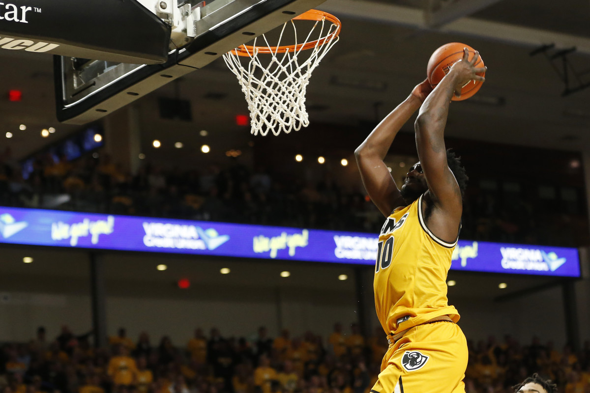 Virginia Commonwealth Rams guard Vince Williams (10) dunks the ball against the LSU Tigers in the first half at Stuart C. Siegel Center.