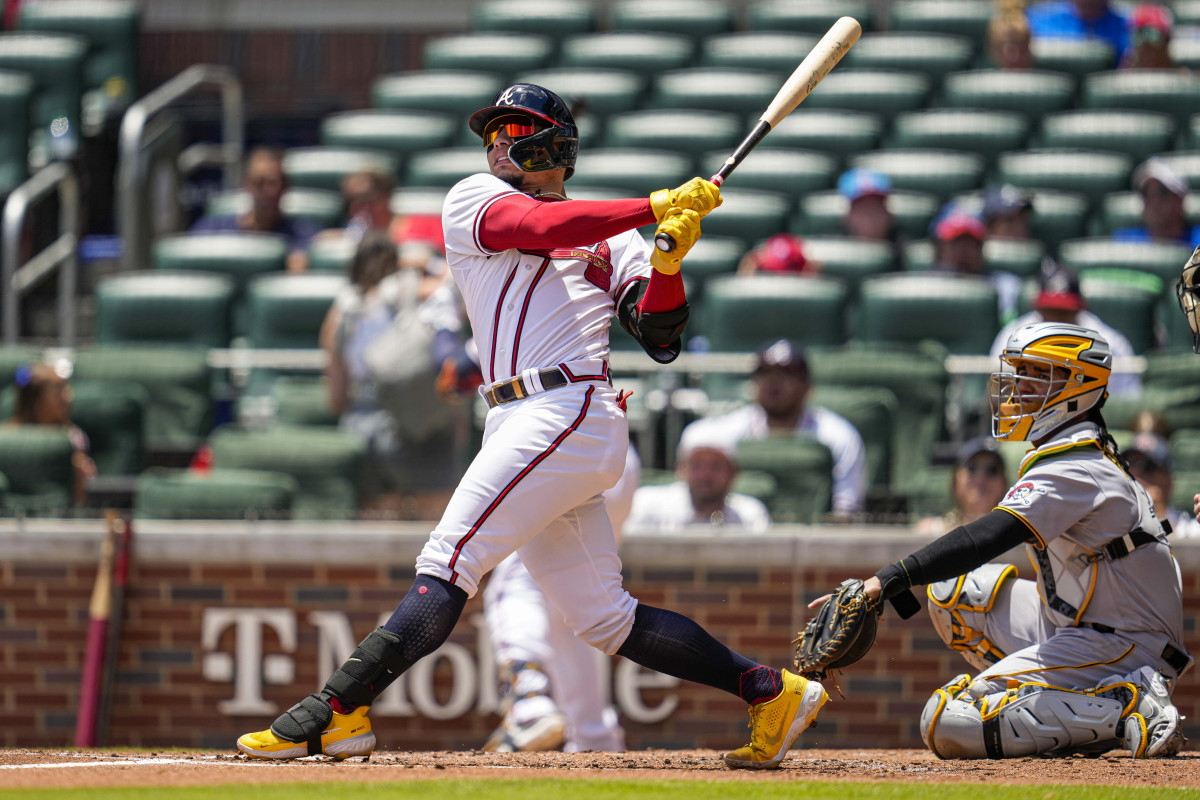 Jun 12, 2022; Cumberland, Georgia, USA; Atlanta Braves catcher William Contreras (24) hits a home run against the Pittsburgh Pirates during the second inning at Truist Park.