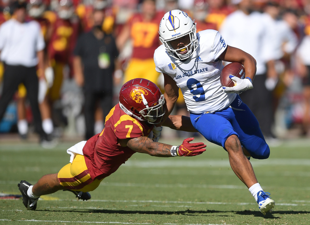 Sep 4, 2021; Los Angeles, California, USA; San Jose State Spartans wide receiver Isaiah Hamilton (9) pulls away from USC Trojans safety Chase Williams (7) for a first down in the second half at United Airlines Field at Los Angeles Memorial Coliseum. Mandatory Credit: Jayne Kamin-Oncea-USA TODAY Sports
