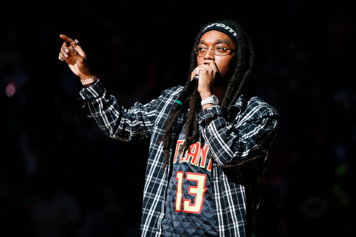 Takeoff from the hip-hop group Migos performs during halftime of a game between the Memphis Grizzlies and Atlanta Hawks at Philips Arena.