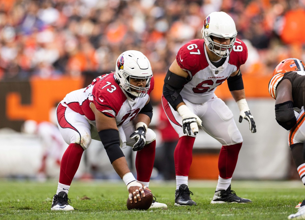 Oct 17, 2021; Cleveland, Ohio, USA; Arizona Cardinals center Max Garcia (73) and guard Justin Pugh (67) at the line of scrimmage against the Cleveland Browns during the second quarter at FirstEnergy Stadium.