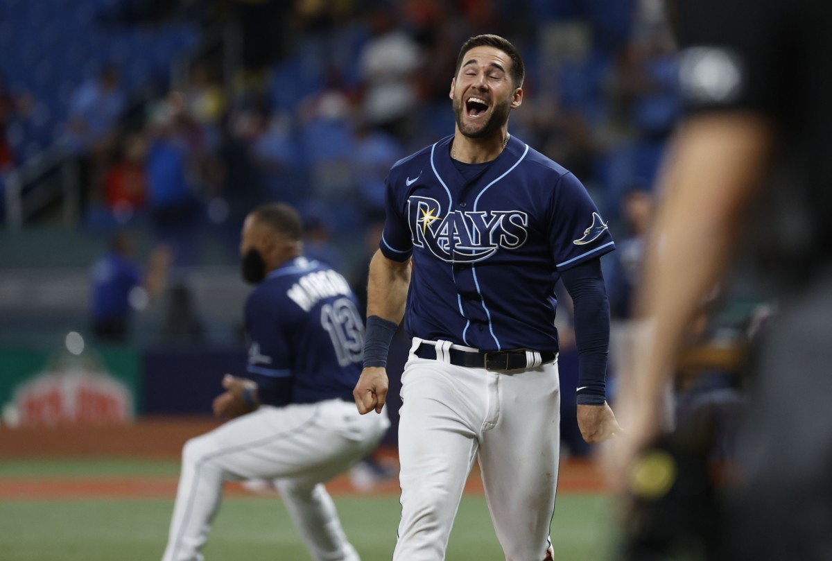 Tampa Bay Rays center fielder Kevin Kiermaier (39) celebrates as shortstop Taylor Walls (not pictured) hits a three-run walk-off home run during the 10th inning against the St. Louis Cardinals at Tropicana Field last week. (Mandatory Credit: Kim Klement-USA TODAY Sports)