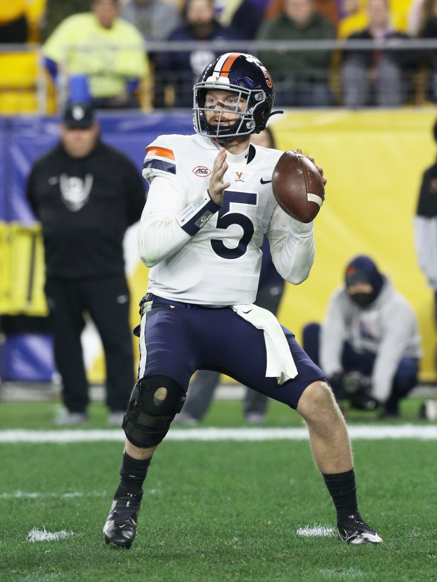 Virginia's Brennan Armstrong gets set to throw a pass against Pittsburgh