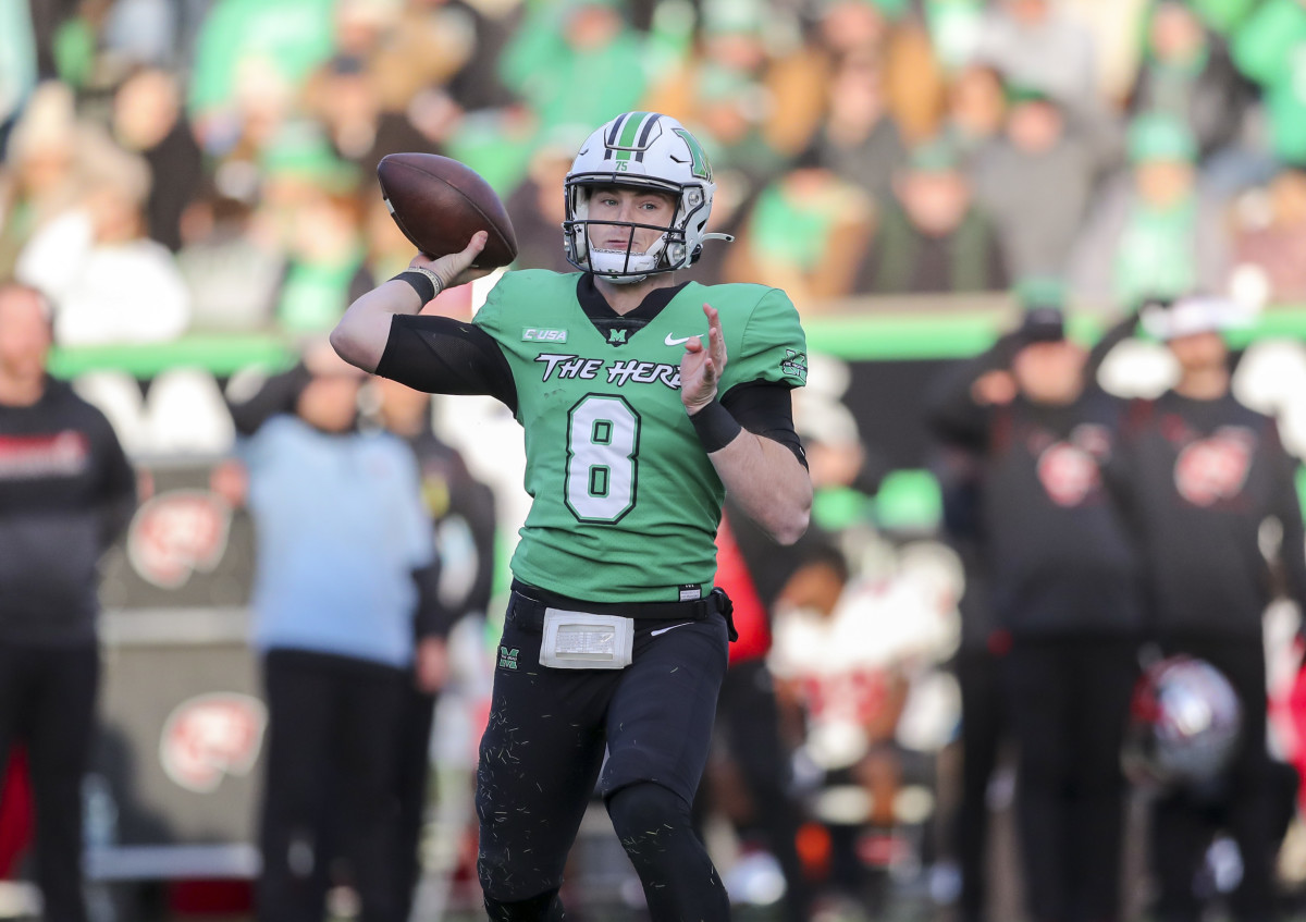 Marshall's Grant Wells throws a pass vs Western Kentucky