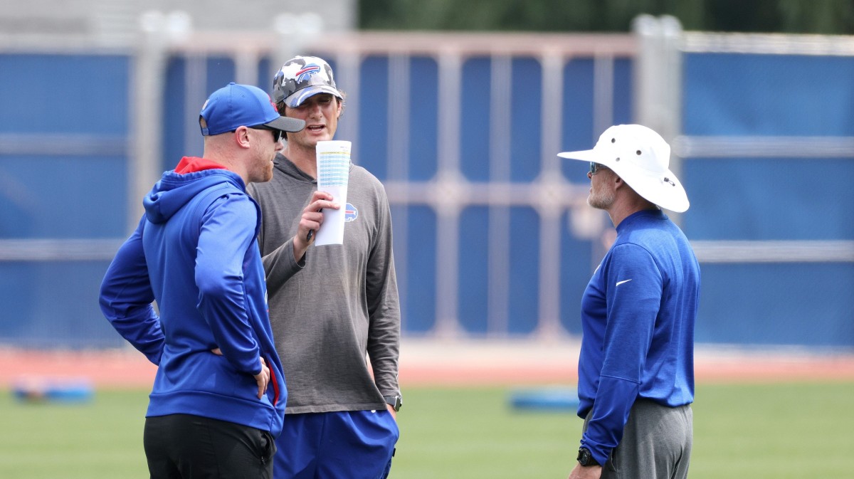 Bills quarterbacks coach Joe Brady (left), offensive coordinator Ken Dorsey (center) and head coach Sean McDermott converge at mandatory minicamp.