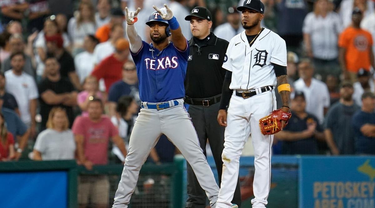 Texas Rangers’ Ezequiel Duran reacts to hitting a three-run triple against the Detroit Tigers in the ninth inning of a baseball game in Detroit, Thursday, June 16, 2022.