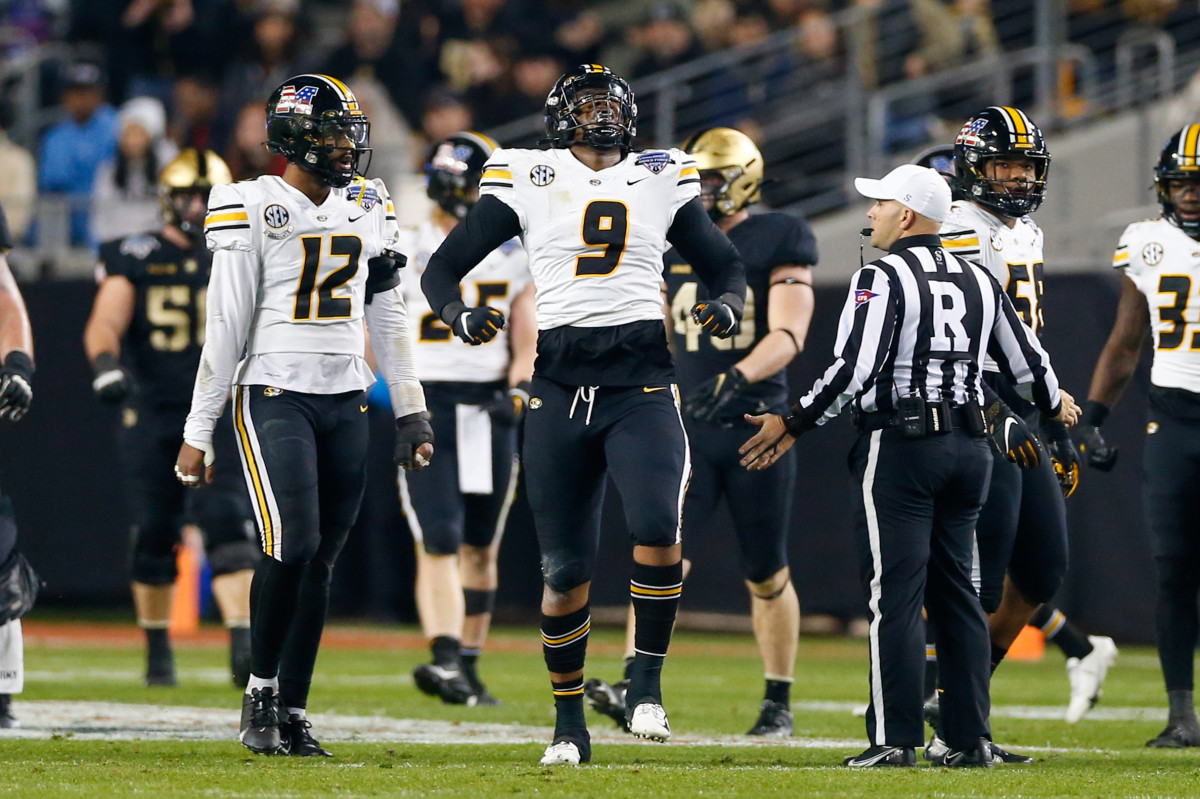 Dec 22, 2021; Fort Worth, Texas, USA; Missouri Tigers defensive lineman Isaiah McGuire (9) celebrates after a play against the Army Black Knights during the first quarter of the 2021 Armed Forces Bowl at Amon G. Carter Stadium. Mandatory Credit: Andrew Dieb-USA TODAY Sports
