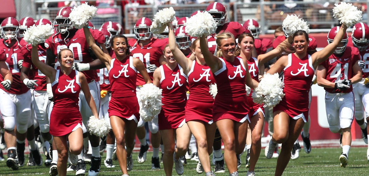 Alabama Crimson Tide cheerleaders prior to a college football game in the SEC.
