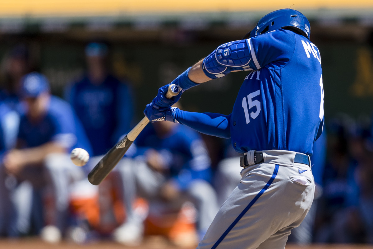 Jun 18, 2022; Oakland, California, USA; Kansas City Royals right fielder Whit Merrifield (15) hits an RBI single against the Oakland Athletics during the ninth inning at RingCentral Coliseum. Mandatory Credit: John Hefti-USA TODAY Sports