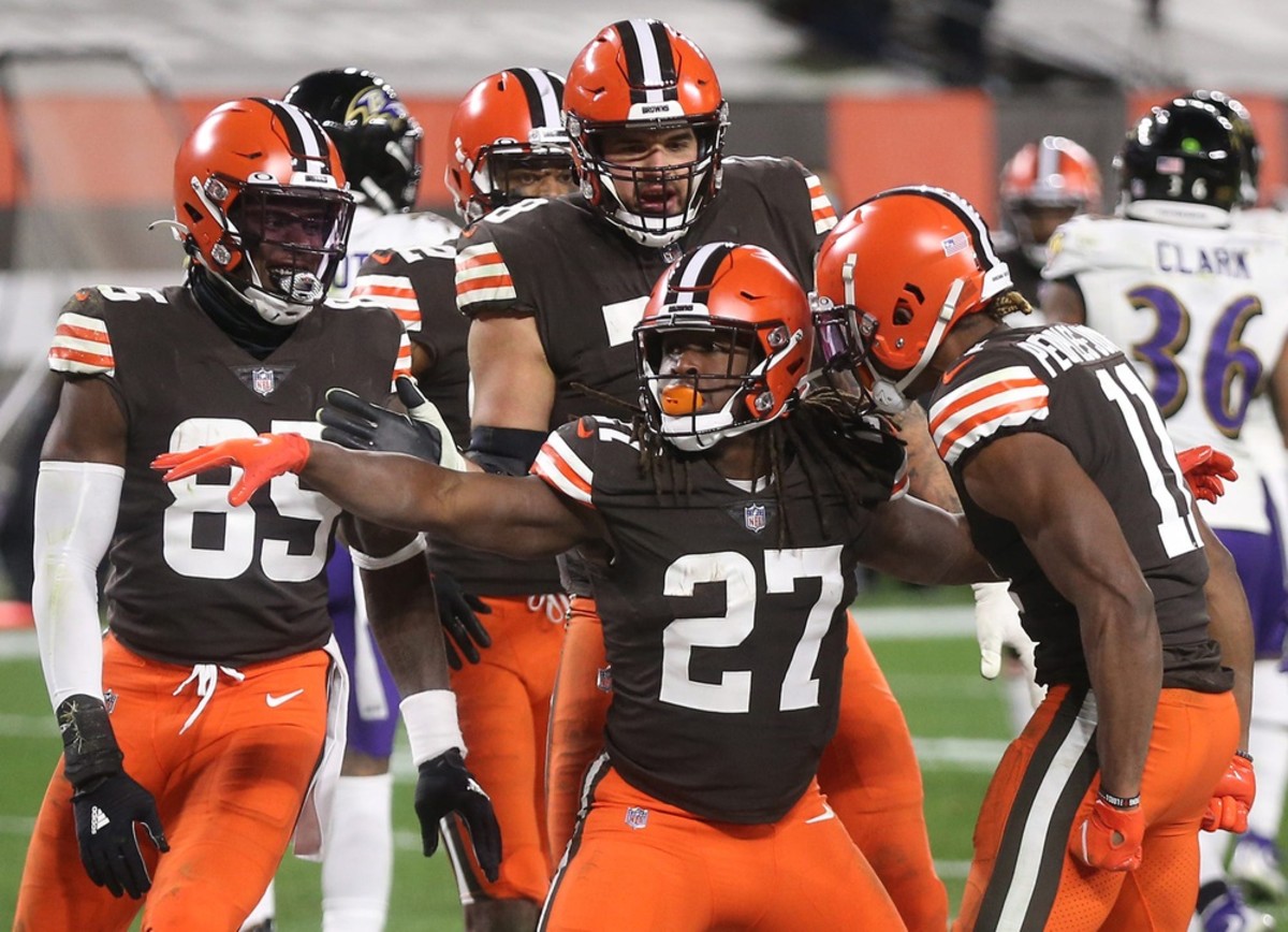 Browns running back Kareem Hunt (27) celebrates with teammates after scoring during the second half against the Baltimore Ravens, Monday, Dec. 14, 2020, in Cleveland, Ohio. [Jeff Lange/Beacon Journal] Browns 22
