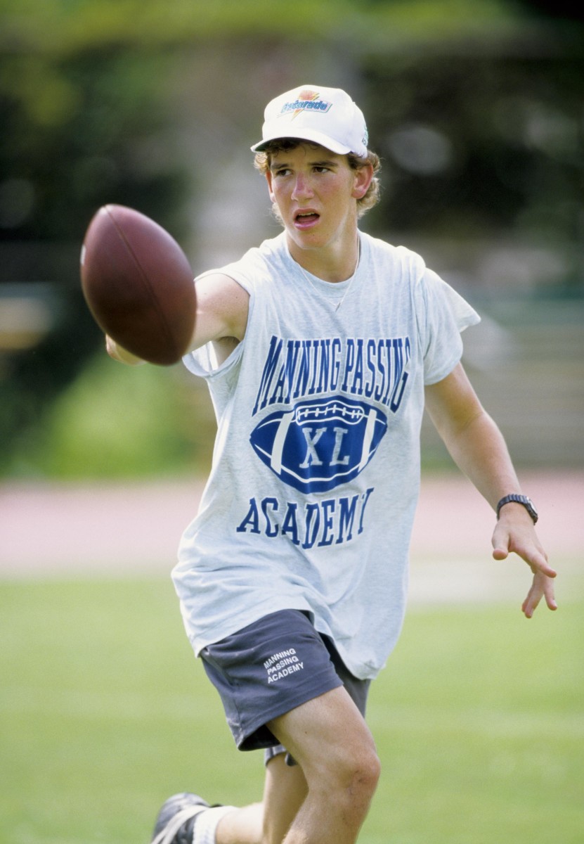Eli Manning goes through a drill during the 1997 Manning Passing Academy. 