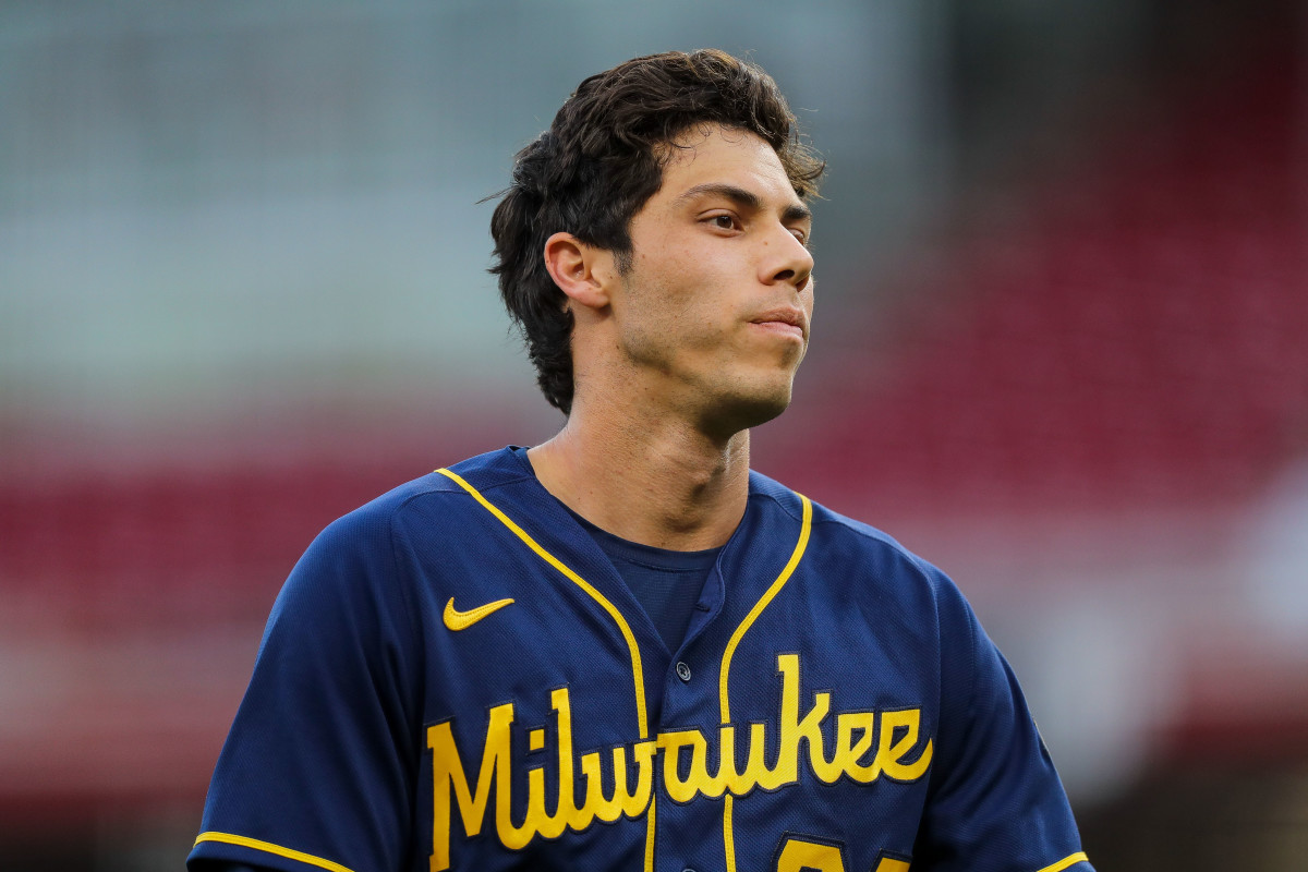 Milwaukee Brewers left fielder Christian Yelich (22) walks off the field after the third inning against the Cincinnati Reds at Great American Ball Park.
