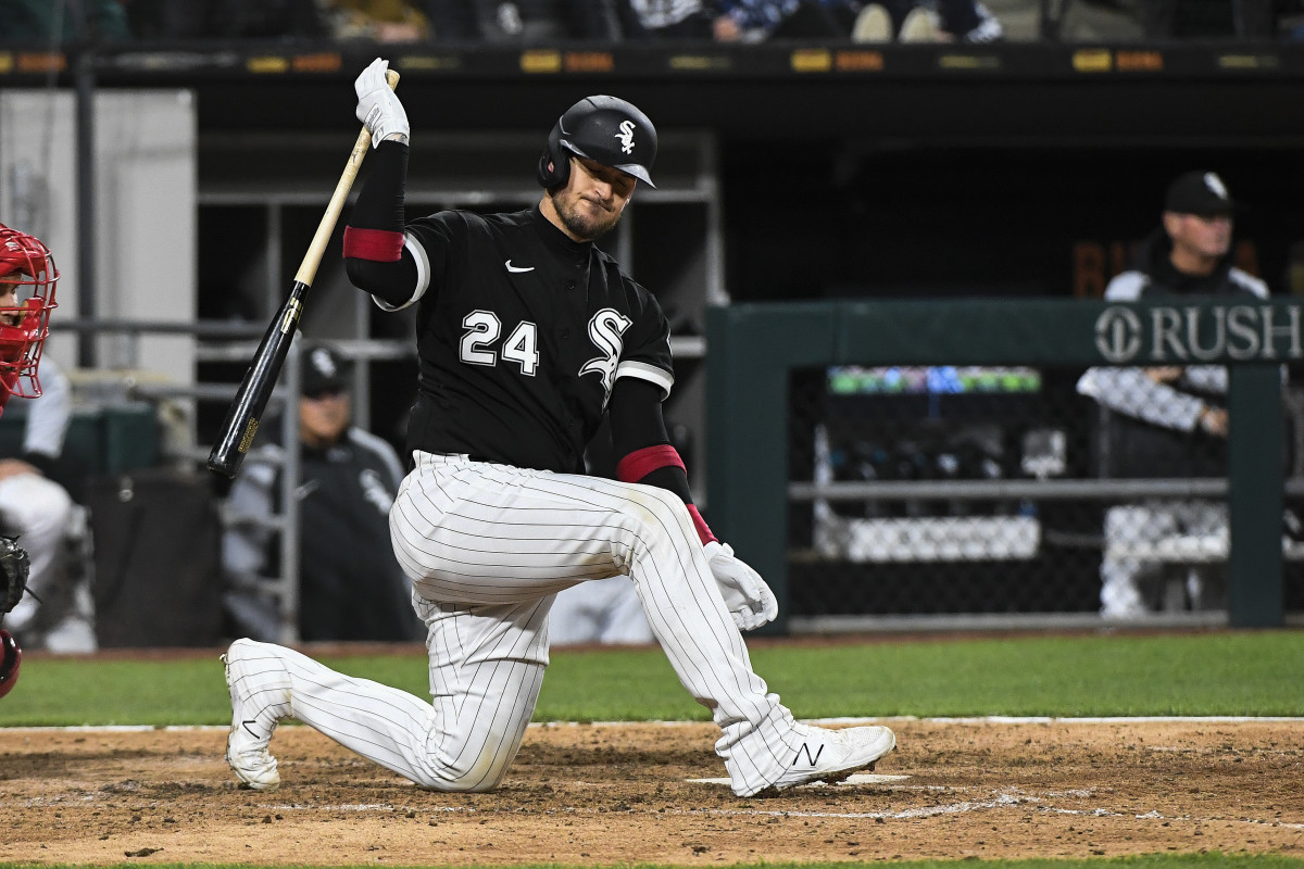 Chicago White Sox catcher Yasmani Grandal (24) slams his bat after striking out swinging during the ninth inning against the Los Angeles Angels at Guaranteed Rate Field.