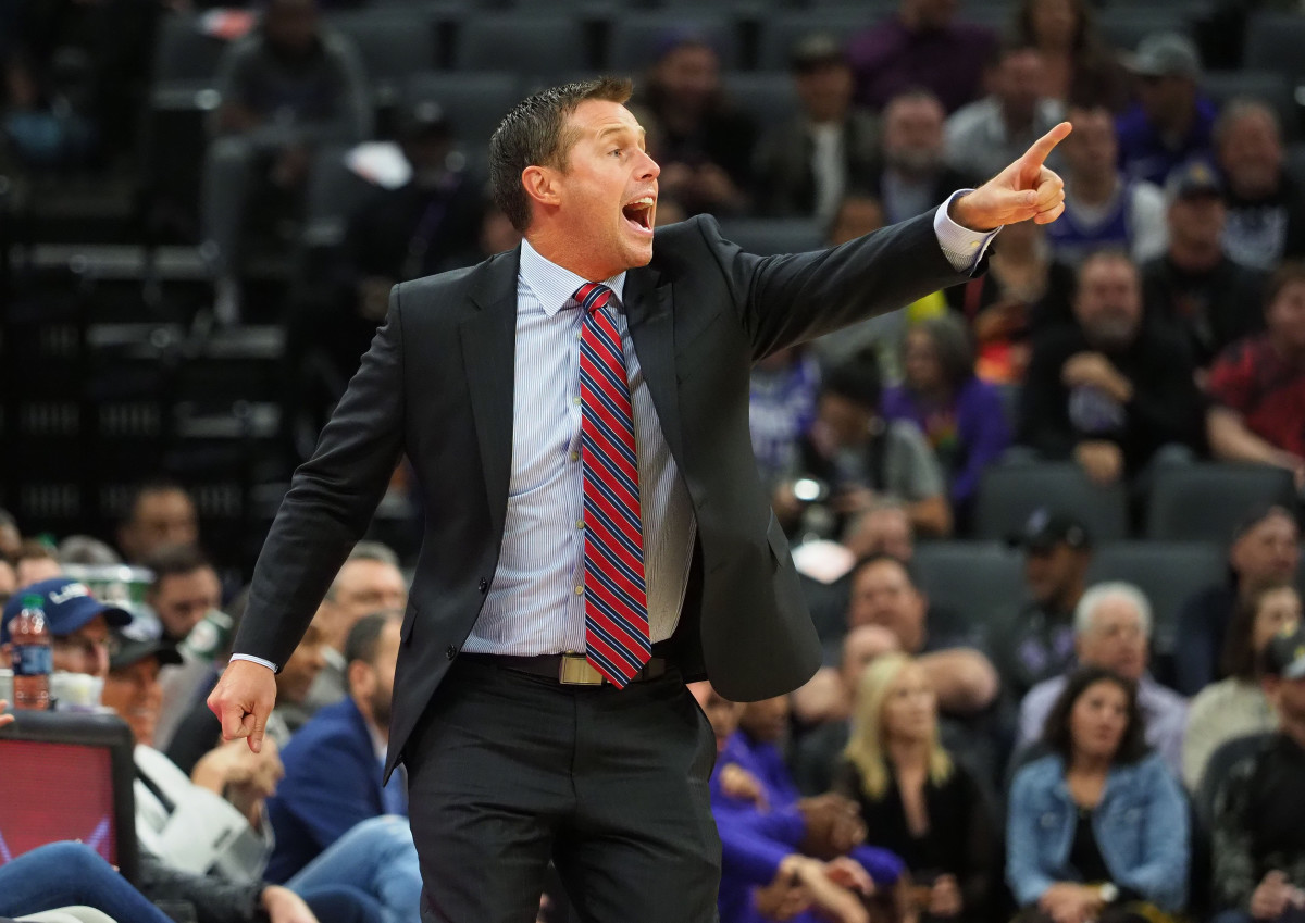 Sacramento Kings head coach Dave Joerger calls out to the players during the first quarter against the Toronto Raptors at Golden 1 Center.