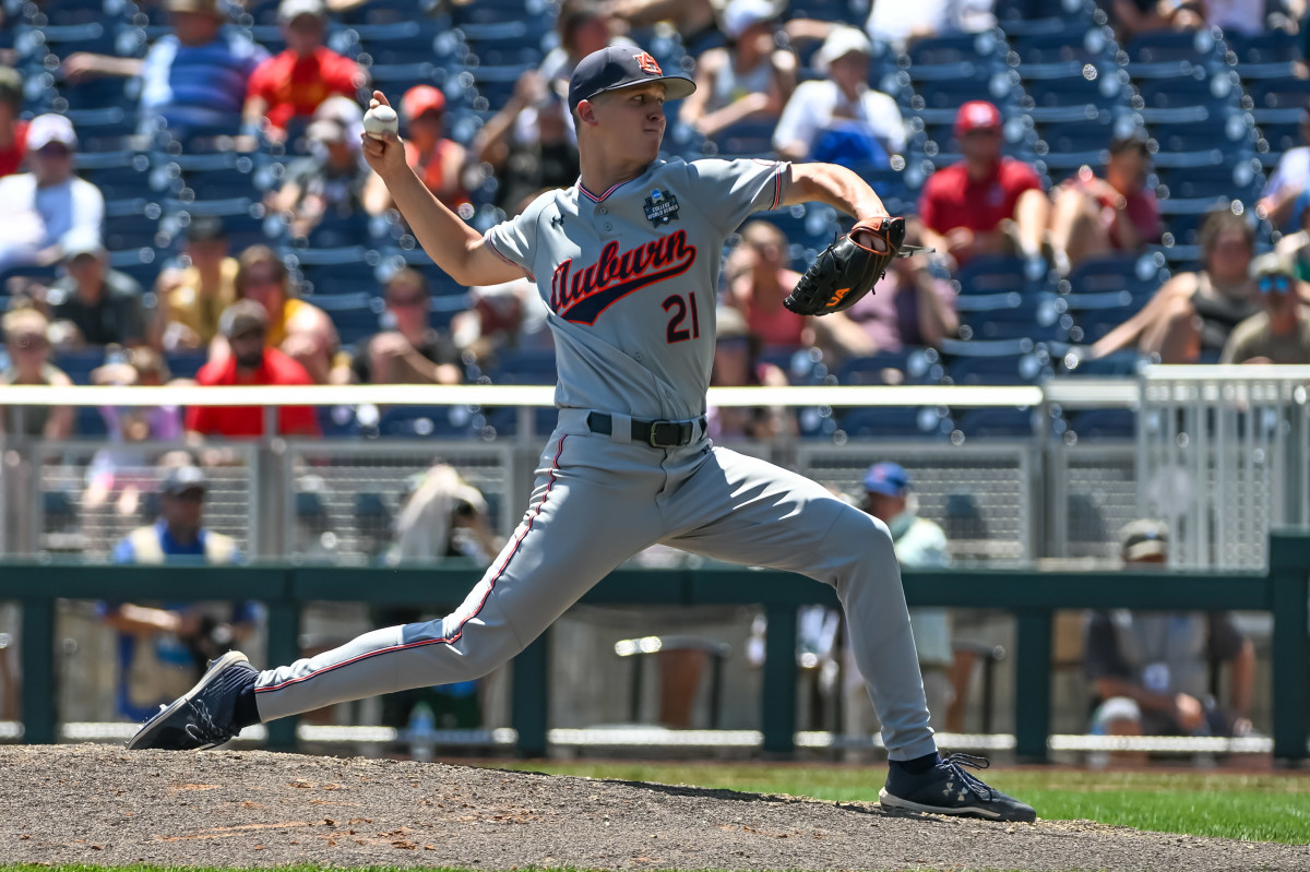 Jun 20, 2022; Omaha, NE, USA; Auburn Tigers pitcher Trace Bright (21) throws in the fourth inning at Charles Schwab Field. Mandatory Credit: Steven Branscombe-USA TODAY Sports