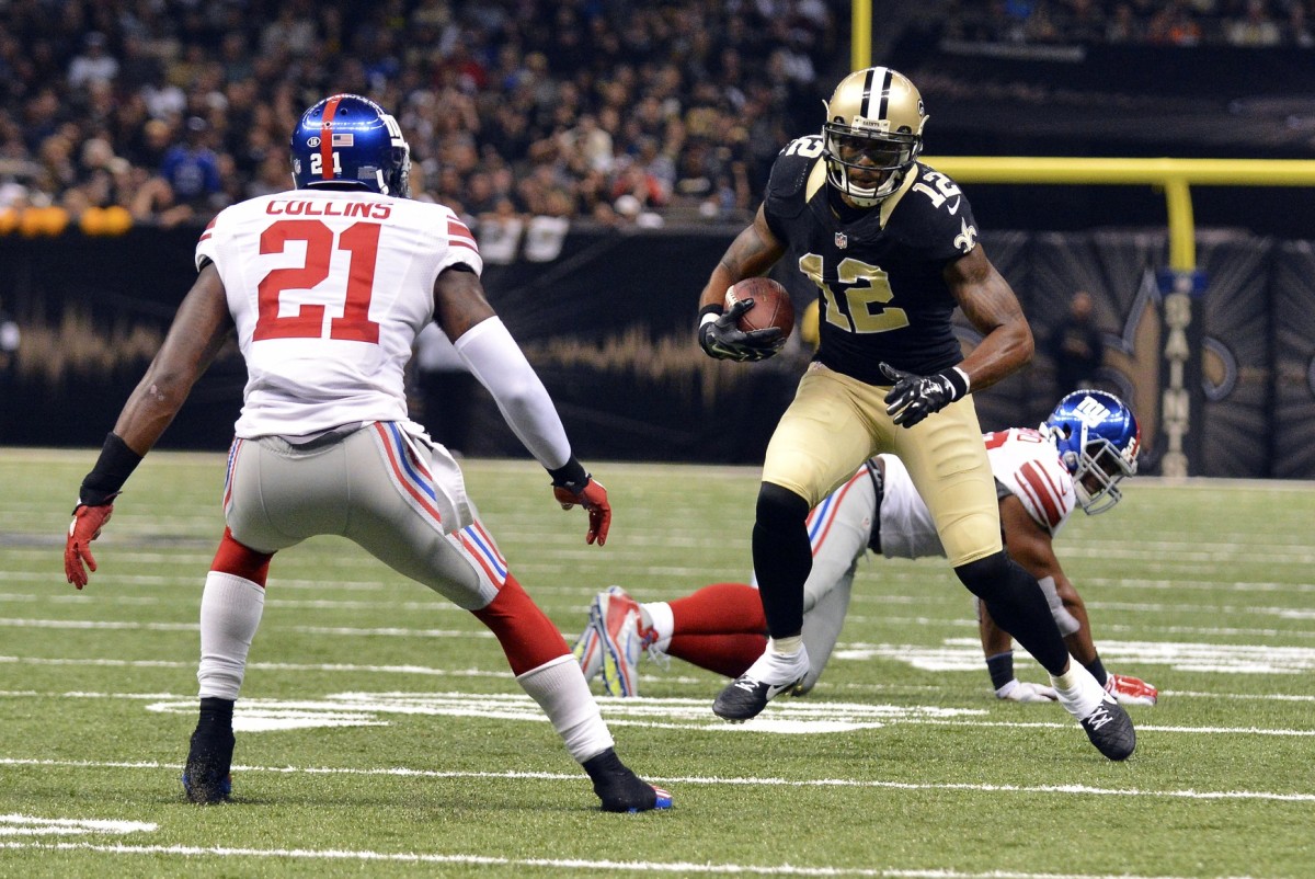 Nov 1, 2015; New Orleans Saints receiver Marques Colston (12) runs the ball after a catch against the New York Giants. Mandatory Credit: Matt Bush-USA TODAY Sports