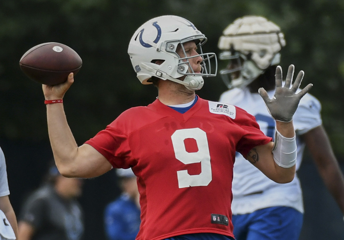 Jun 7, 2022; Indianapolis, Indiana, USA; Indianapolis Colts quarterback Nick Foles (9) throws a pass during minicamp at the Colts practice facility.