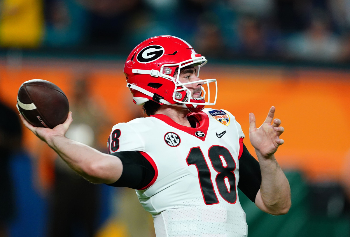 Georgia Bulldogs quarterback JT Daniels (18) warms up prior to the Orange Bowl college football CFP national semifinal game against the Michigan Wolverines at Hard Rock Stadium