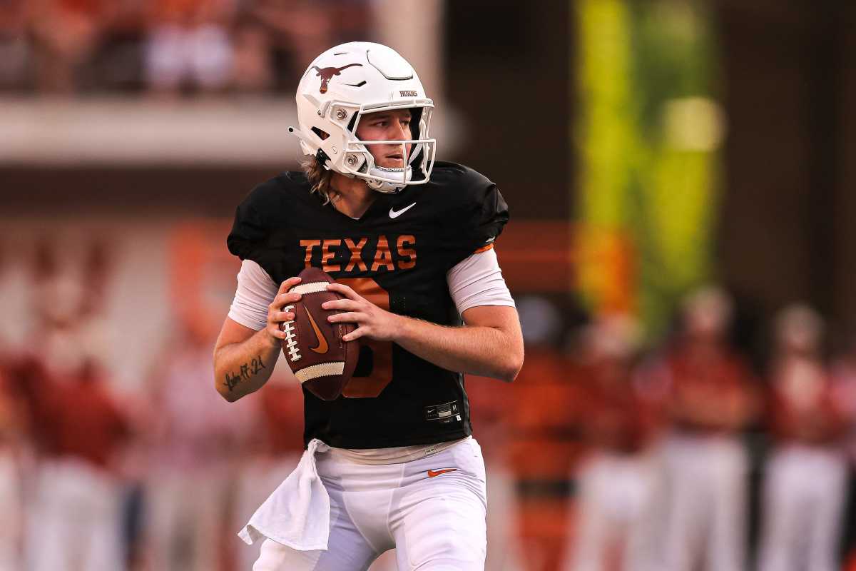 Texas quarterback Quinn Ewers (3) looks for an open receiver during Texas's annual spring football game at Royal Memorial Stadium in Austin, Texas on April 23, 2022.
