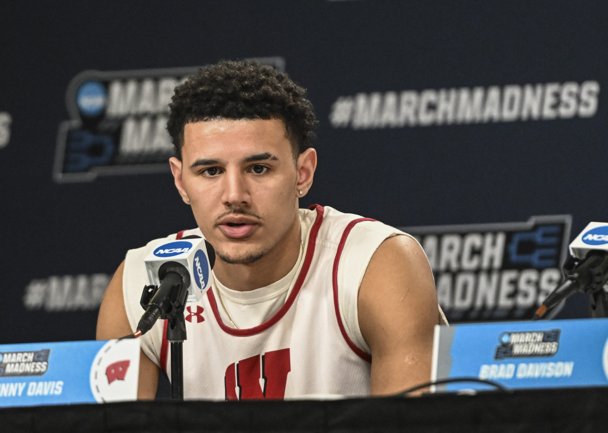 Wisconsin Badgers guard Johnny Davis (1) answers questions during practice before the first round of the 2022 NCAA Tournament at Fiserv Forum.