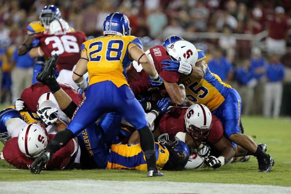 Stanford Cardinal running back Tyler Gaffney (25) scores a touchdown against the San Jose State Spartans during the fourth quarter at Stanford Stadium. The Stanford Cardinal defeated the San Jose State Spartans 34-13.