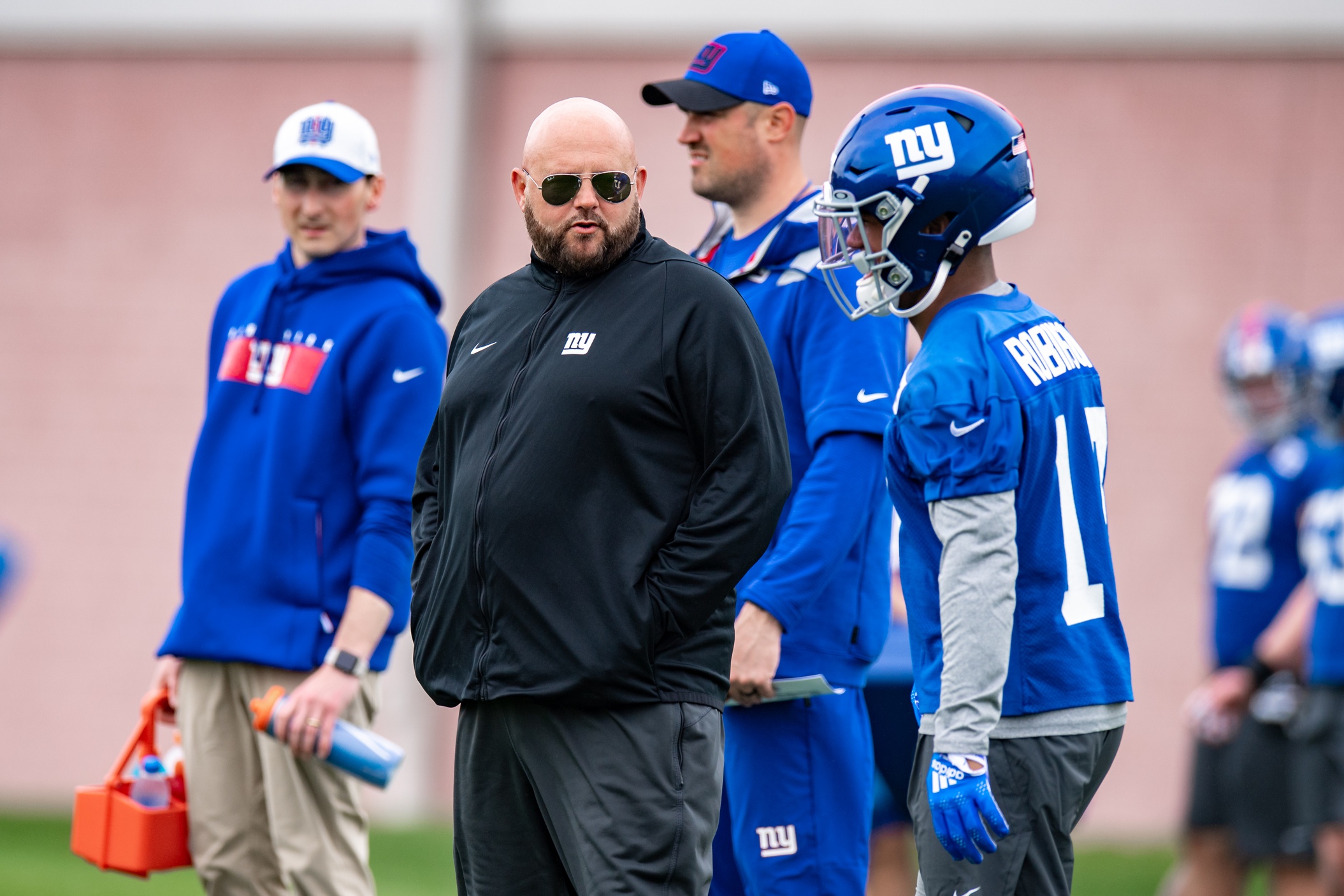 May 13, 2022; East Rutherford, NJ, USA; New York Giants head coach Brian Daboll chats with New York Giants wide receiver Wan'Dale Robinson (17) during rookie camp at Quest Diagnostics Training Center.