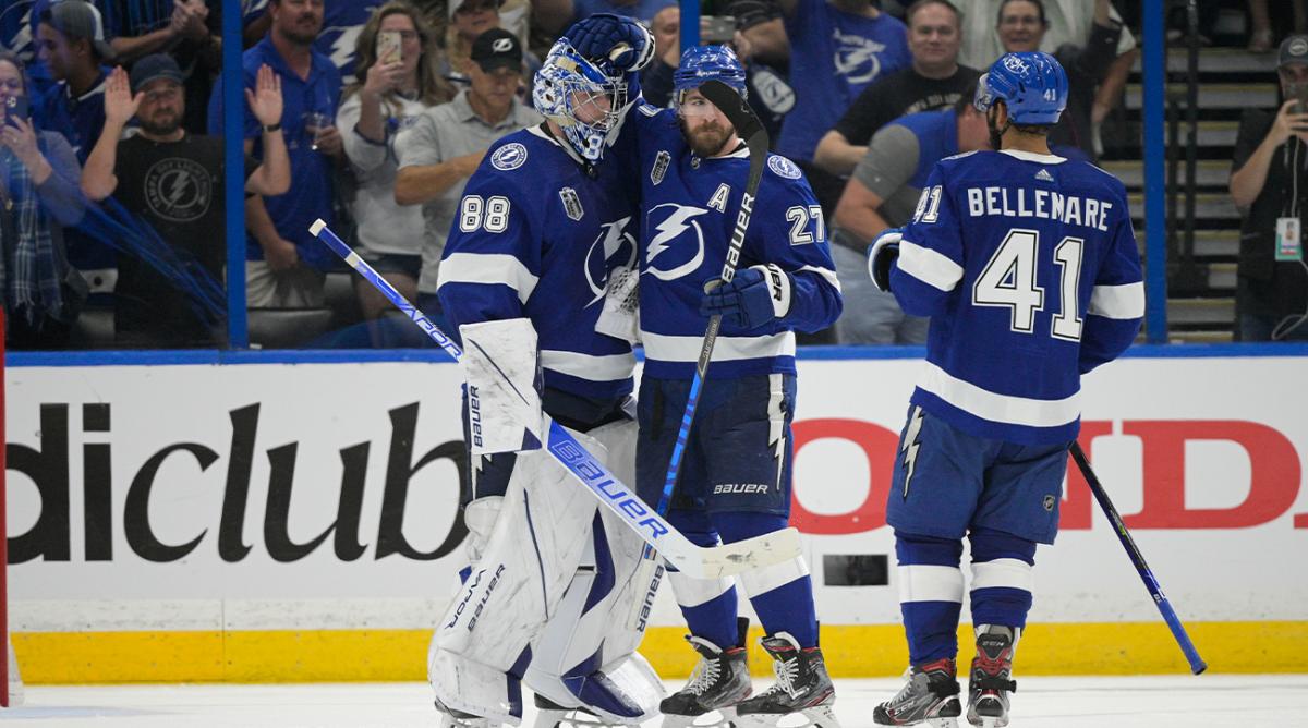 Tampa Bay Lightning goaltender Andrei Vasilevskiy (88) celebrates with Tampa Bay Lightning defenseman Ryan McDonagh (27) after Game 3 of the NHL hockey Stanley Cup Final against Colorado Avalanche on Monday, June 20, 2022, in Tampa, Fla.