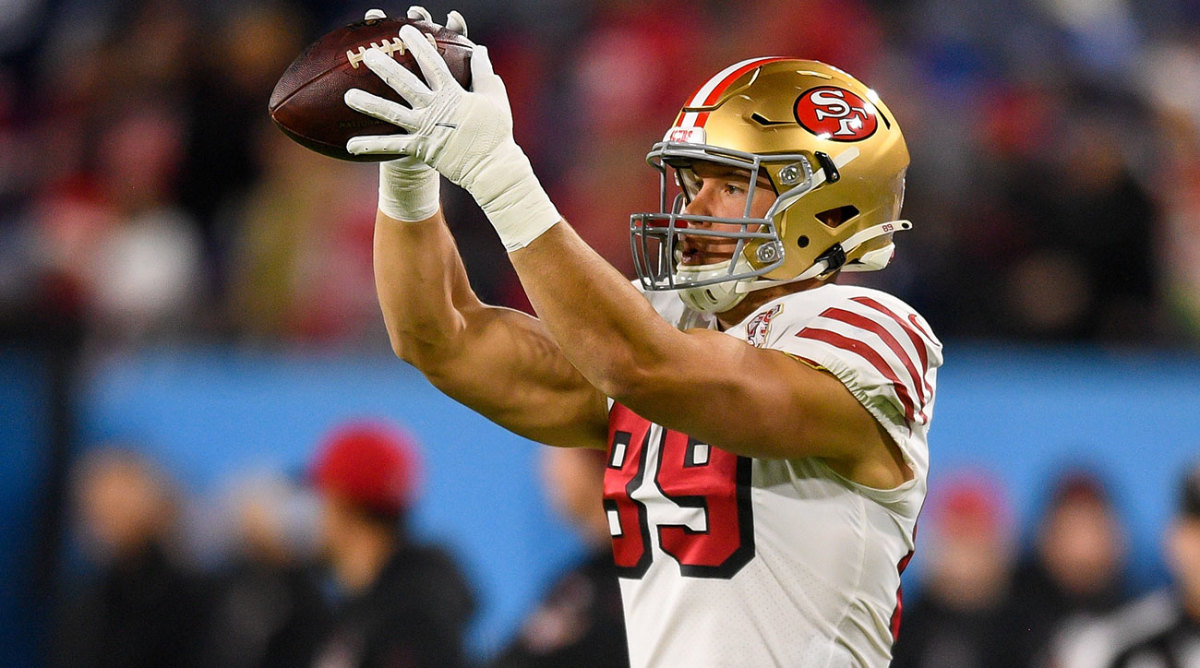 49ers tight end Charlie Woerner catches a pass in warmups.