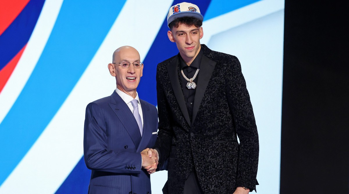 Chet Holmgren (Gonzaga) shakes hands with NBA commissioner Adam Silver after being selected as the number two overall pick by the Oklahoma City Thunder in the first round of the 2022 NBA Draft at Barclays Center.