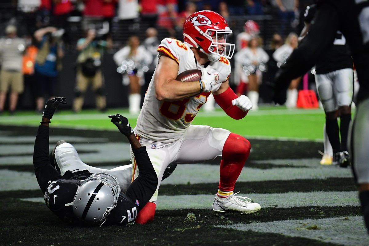 Nov 14, 2021; Paradise, Nevada, USA; Kansas City Chiefs tight end Noah Gray (83) scores a touchdown against the Las Vegas Raiders during the second half at Allegiant Stadium. Mandatory Credit: Gary A. Vasquez-USA TODAY Sports