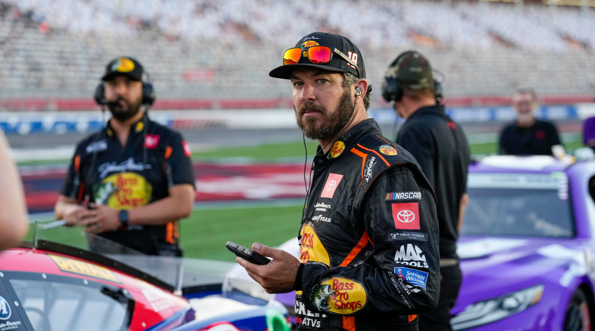 May 28, 2022; Concord, North Carolina, USA; NASCAR Cup Series driver Martin Truex Jr. (19) looks towards the scoring pod during Nascar Cup qualifying at Charlotte Motor Speedway.
