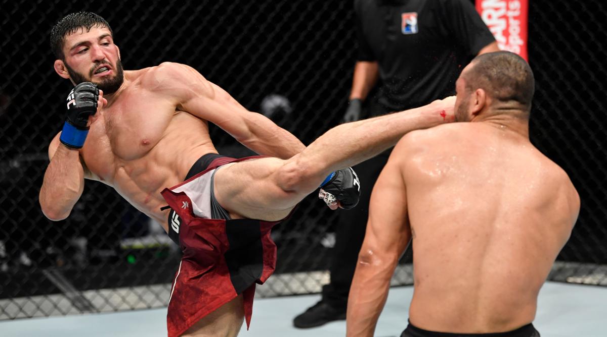 July 19, 2020; Abu Dhabi, UAE; Arman Tsarukyan of Armenia kicks Davi Ramos of Brazil in their lightweight bout during UFC Fight Night at the Flash Forum on UFC Fight Island.