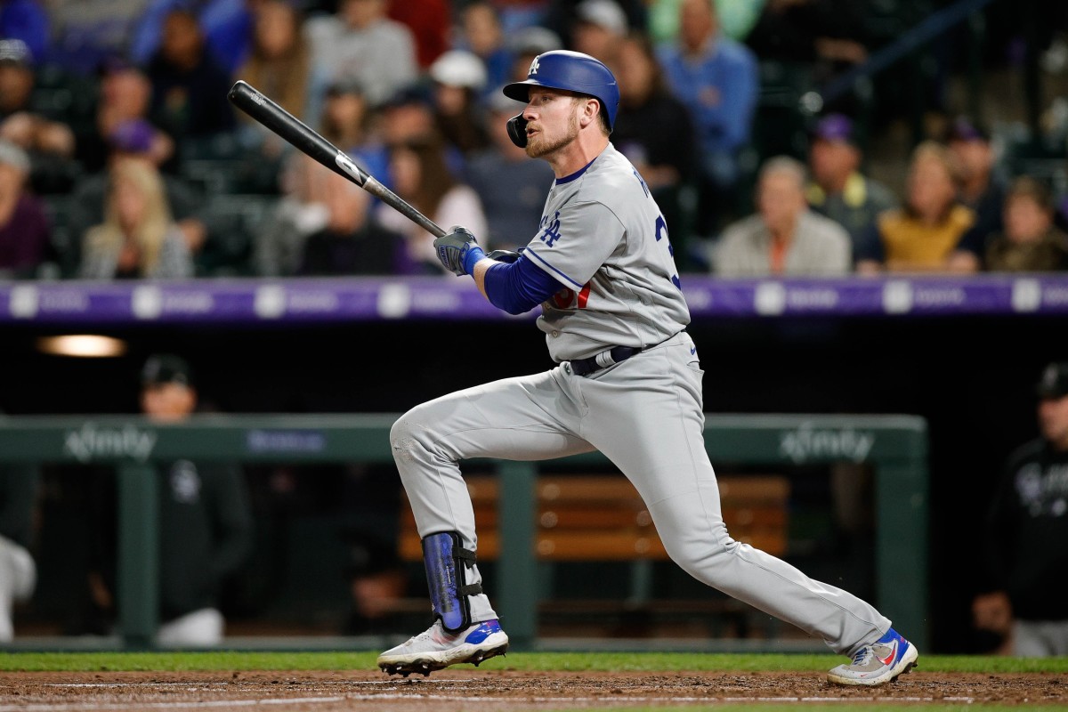 Los Angeles Dodgers right fielder Luke Raley (37) hits a single against the Colorado Rockies in the fifth inning at Coors Field on Sept. 21, 2021. (Isaiah J. Downing-USA TODAY Sports)