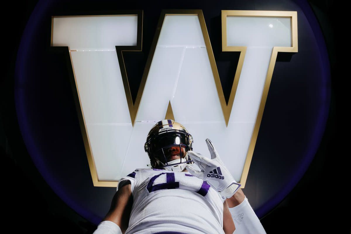 Anthony James II posed on a recruiting visit to the UW.