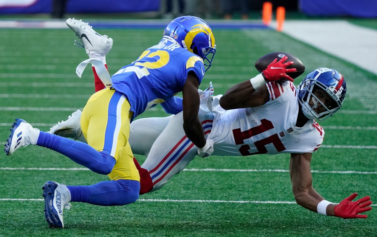 Oct 17, 2021; East Rutherford, New Jersey, USA; New York Giants wide receiver Collin Johnson (15) cannot hang onto a pass as Los Angeles Rams defensive back David Long (22) defends at MetLife Stadium.