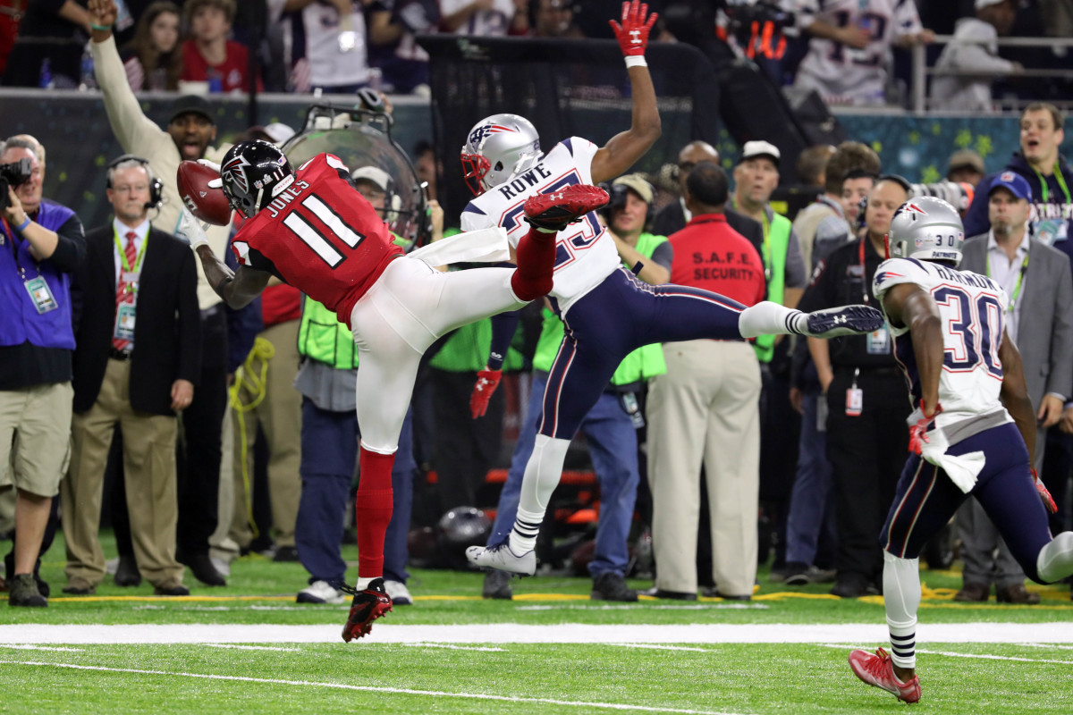 Feb 5, 2017; Houston, TX, USA; Atlanta Falcons wide receiver Julio Jones (11) makes a catch in front of New England Patriots cornerback Eric Rowe (25) in the fourth quarter during Super Bowl LI at NRG Stadium.