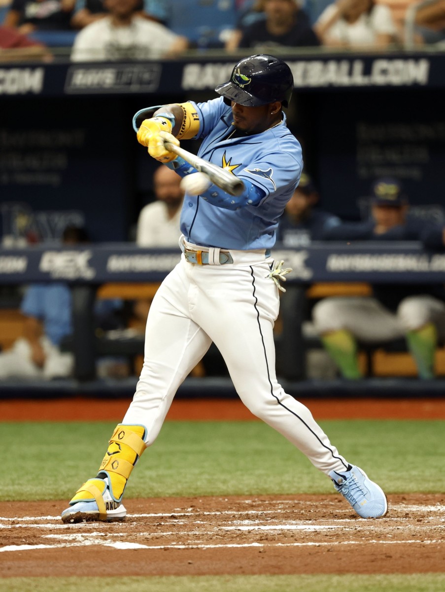 Tampa Bay Rays shortstop Wander Franco (5) singles during the third inning against the Pittsburgh Pirates at Tropicana Field. (Kim Klement-USA TODAY Sports)