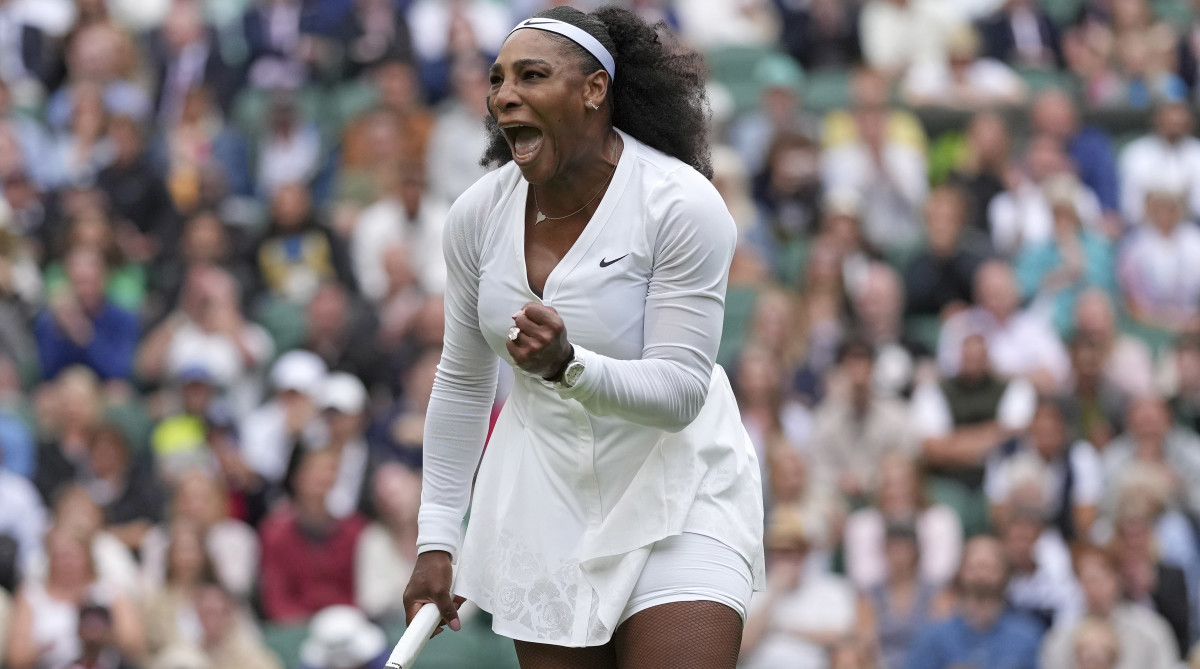 Serena Williams celebrates winning a point against Harmony Tan at Wimbledon.