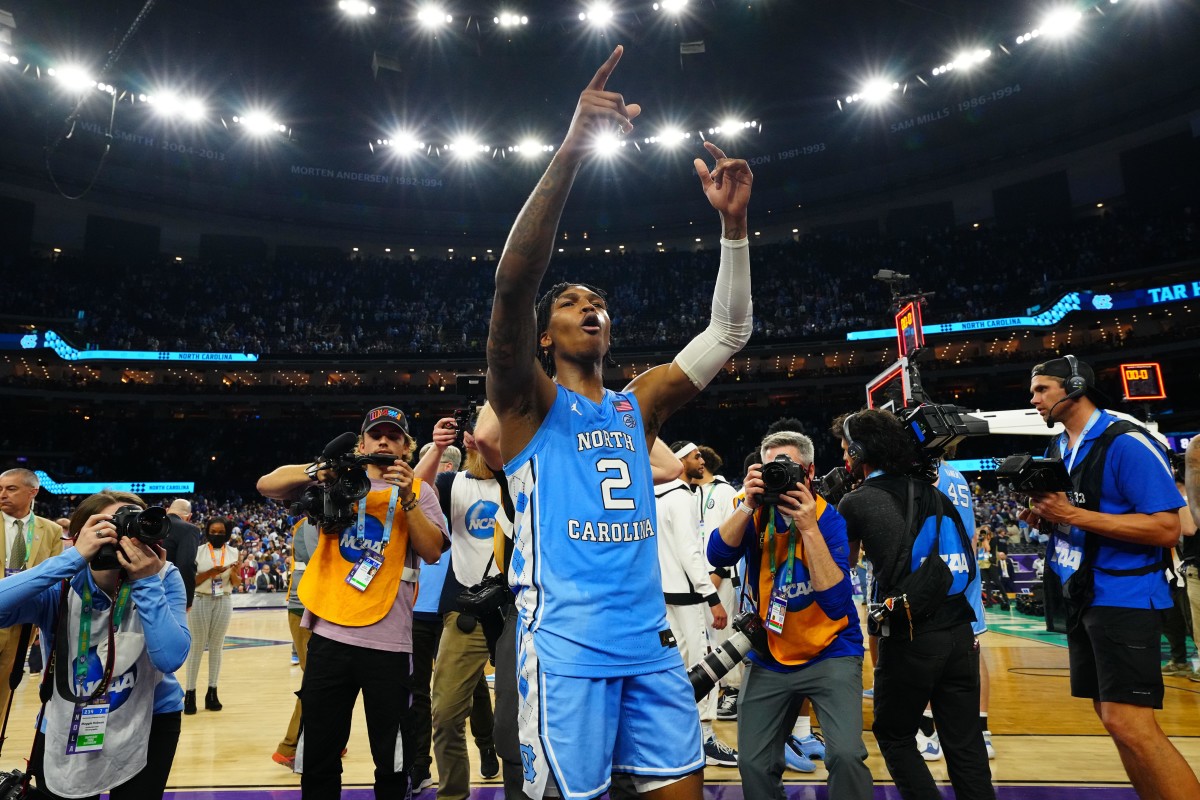North Carolina Tar Heels guard Caleb Love (2) celebrates after defeating the Duke Blue Devils during the 2022 NCAA men's basketball tournament Final Four semifinals at Caesars Superdome.