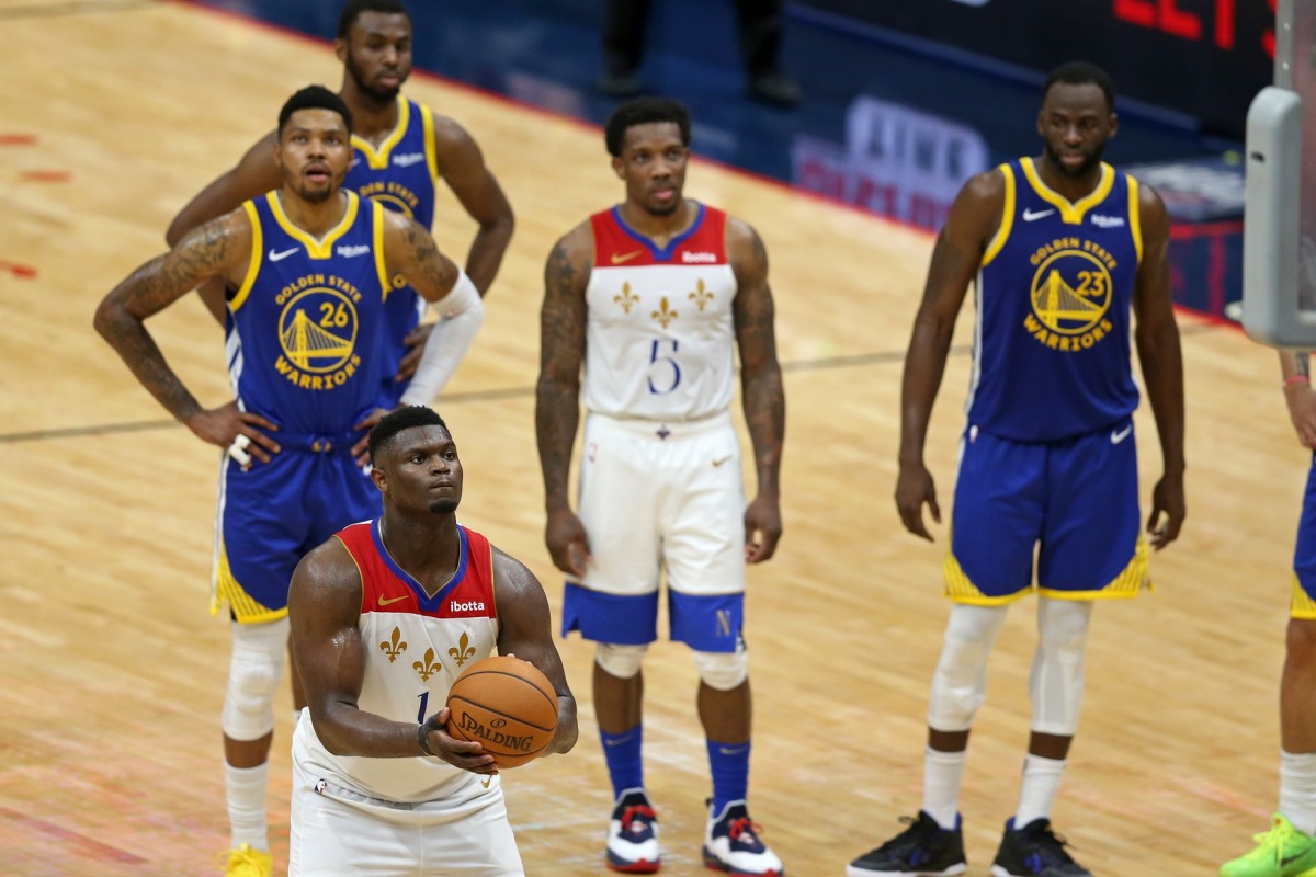 May 4, 2021; New Orleans, Louisiana, USA; New Orleans Pelicans forward Zion Williamson (1) shoots a technical foul free throw as players watch late in the fourth quarter against the Golden State Warriors at the Smoothie King Center. Mandatory Credit: Chuck Cook-USA TODAY Sports