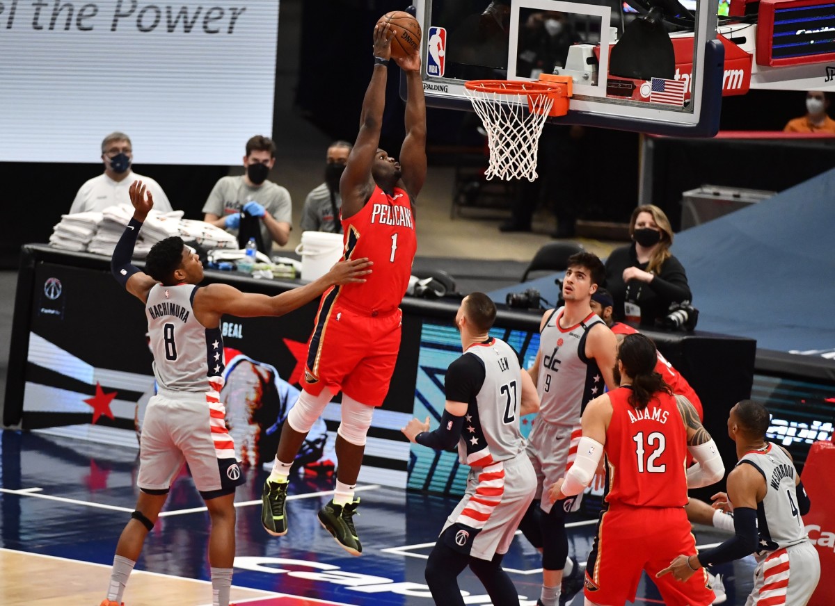 Apr 16, 2021; Washington, District of Columbia, USA; New Orleans Pelicans forward Zion Williamson (1) dunks the ball against the Washington Wizards at Capital One Arena. Mandatory Credit: Brad Mills-USA TODAY Sports
