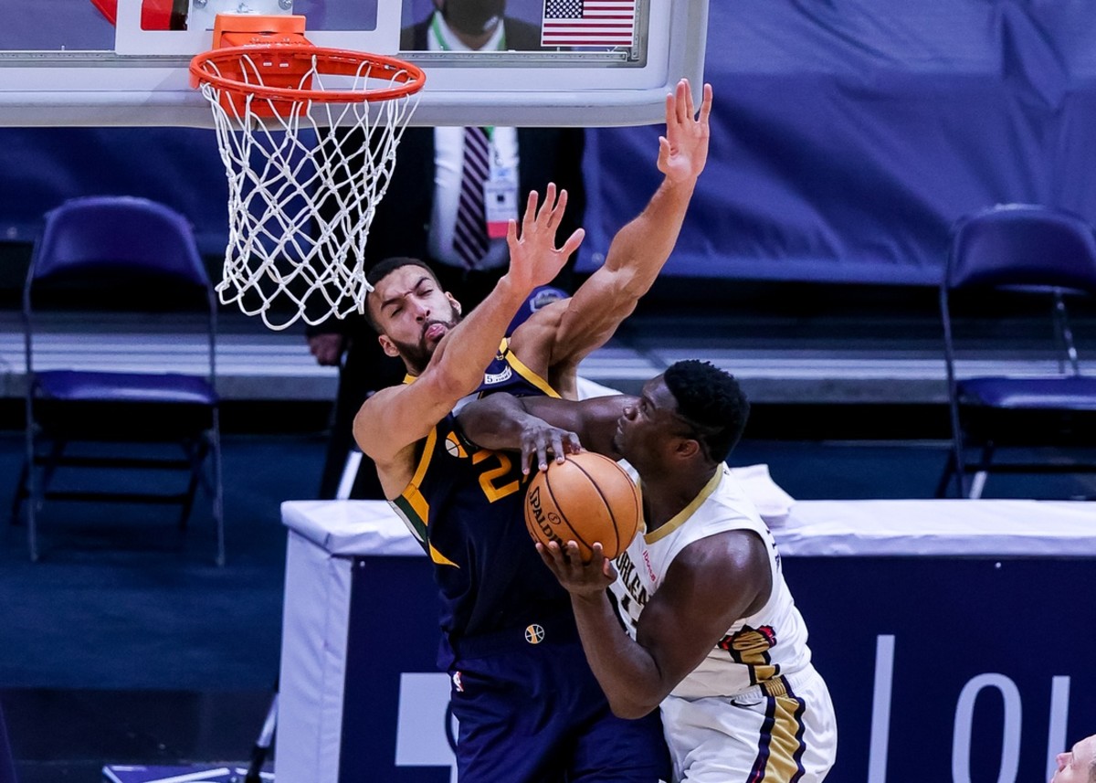 Mar 1, 2021; New Orleans, Louisiana, USA; New Orleans Pelicans forward Zion Williamson (1) drives to the basket against Utah Jazz center Rudy Gobert (27) during the second half at the Smoothie King Center. Mandatory Credit: Stephen Lew-USA TODAY Sports