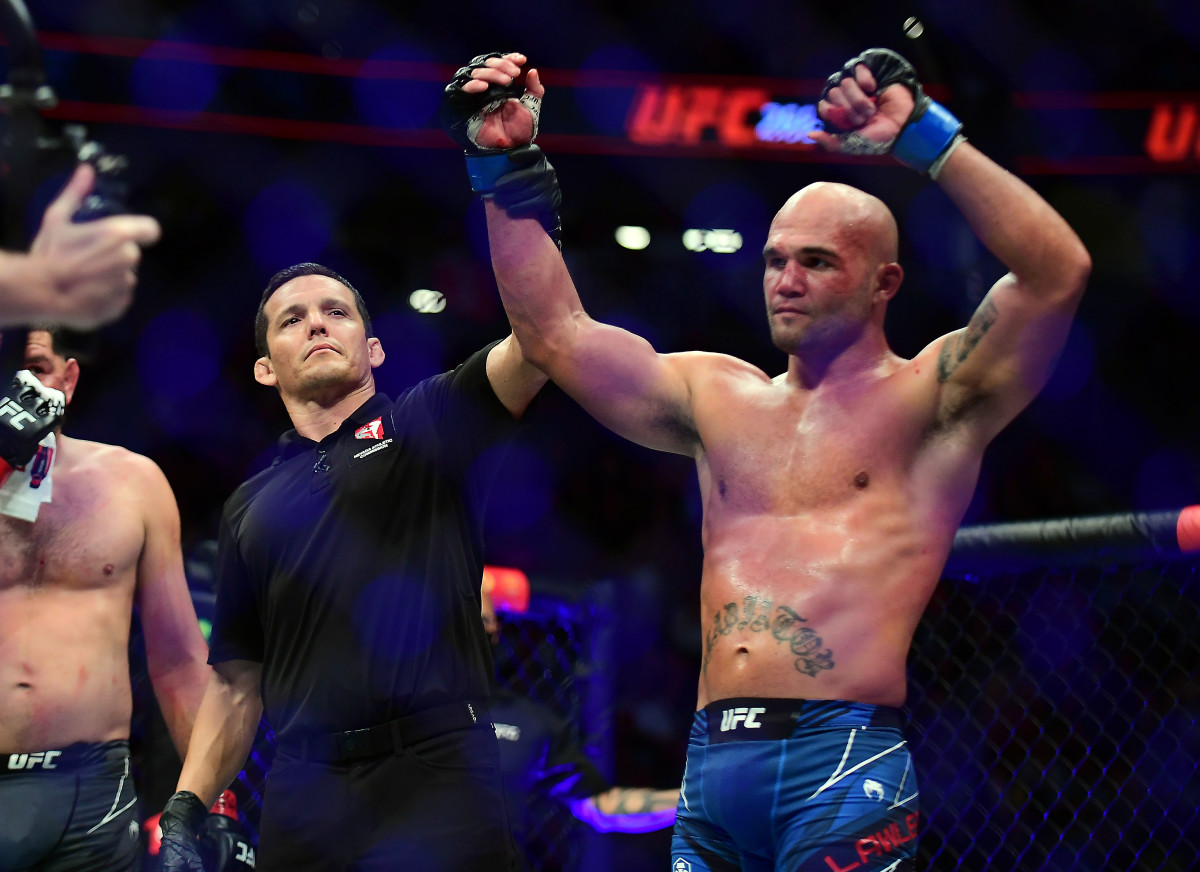 Robbie Lawler is declared the winner by TKO against Nick Diaz during UFC 266 at T-Mobile Arena.