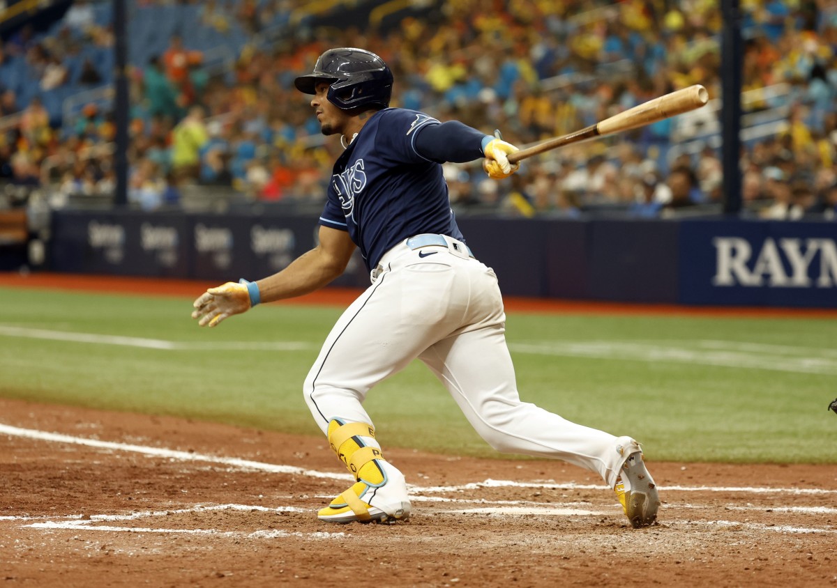 Tampa Bay Rays shortstop Wander Franco (5) hits a RBI double against the Milwaukee Brewers during the fifth inning at Tropicana Field. (Kim Klement-USA TODAY Sports)