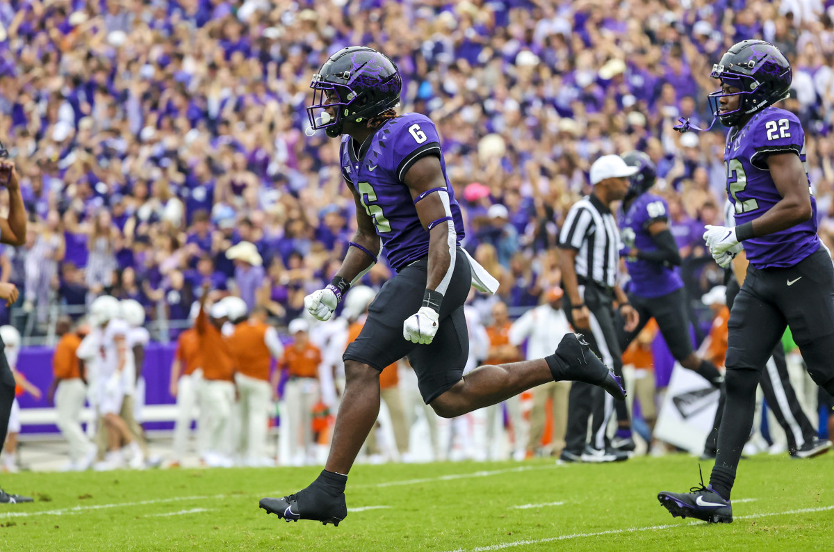 Oct 2, 2021; Fort Worth, Texas, USA; TCU Horned Frogs running back Zach Evans (6) reacts after scoring a touchdown during the first quarter against the Texas Longhorns at Amon G. Carter Stadium. Mandatory Credit: Kevin Jairaj-USA TODAY Sports