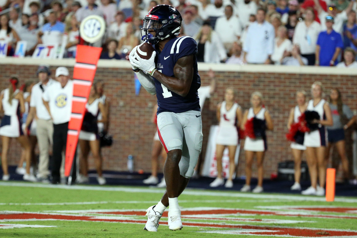 Sep 11, 2021; Oxford, Mississippi, USA; Mississippi Rebels wide receiver Jonathan Mingo (1) catches a pass for a touchdown against the Austin Peay Governors during the second quarter at Vaught-Hemingway Stadium. Mandatory Credit: Petre Thomas-USA TODAY Sports