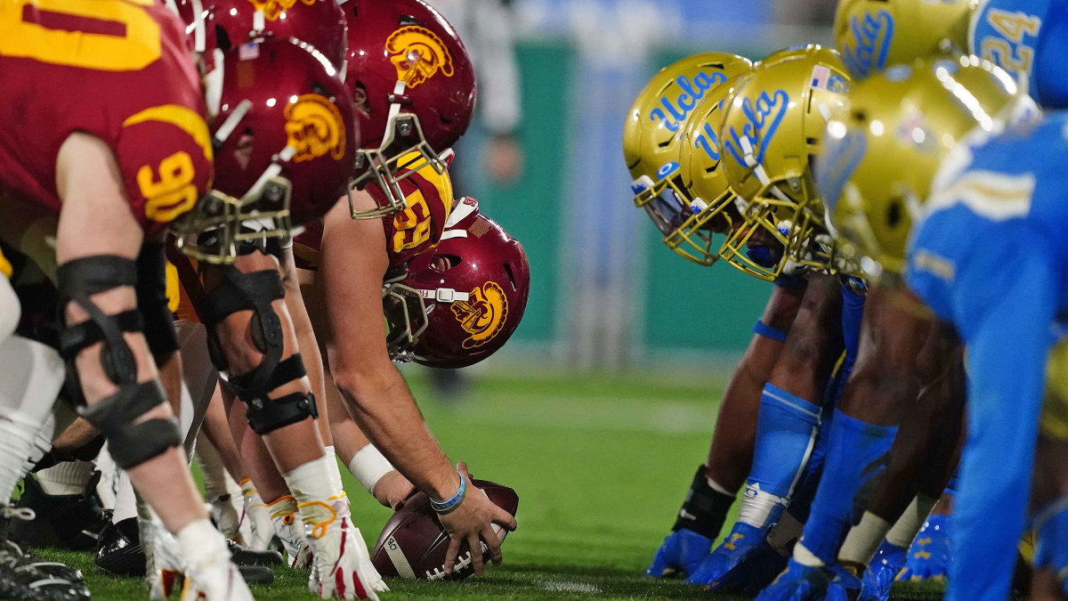 USC and UCLA at the line of scrimmage in a football game