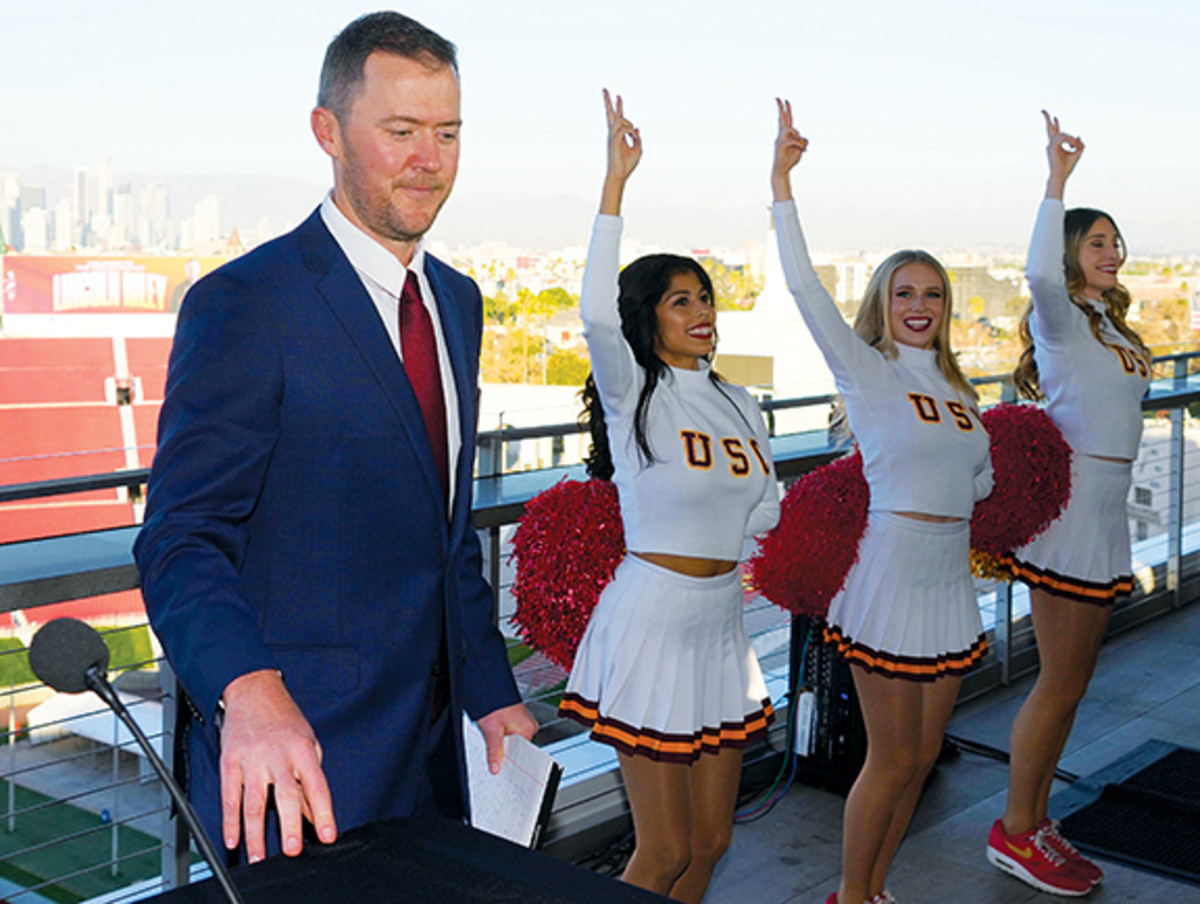 Lincoln Riley reacts during a press conference to introduce Riley as Southern California Trojans head coach at the Los Angeles Memorial Coliseum.